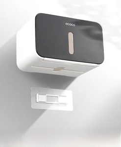 Detail of wall-mounted tissue box with secure adhesive and ecoco brand logo