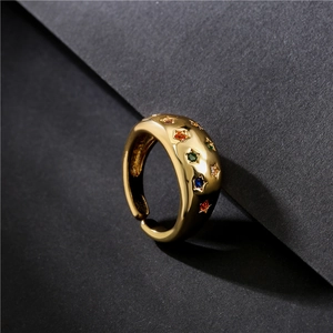 18K gold plated wide band open ring with colorful zircon stars on a matte background