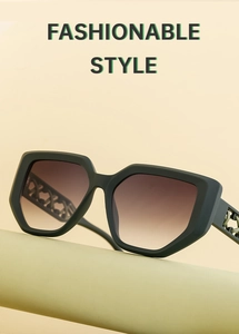 Detail of dark green matte sunglasses with gradient brown lenses and metal chain temples