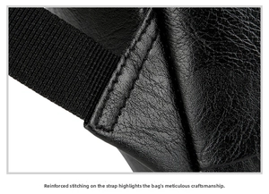 Detail of reinforced stitching on the black leather commuter backpack strap connection