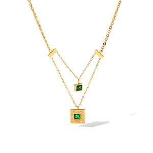 Double-layered gold necklace with emerald green zircon square pendants and sparkling crystal trim