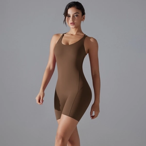 Close-up of brown cross-back yoga jumpsuit with high-stretch fabric and U-neck design