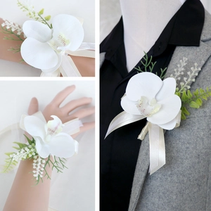 White orchid wedding boutonniere and wrist corsage set with elegant satin ribbons