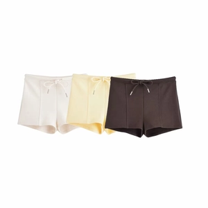 Women's cotton drawstring shorts set in white, light yellow, and dark brown colors
