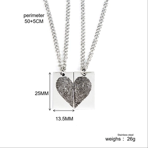 Detail of couple necklaces showing dimensions and fingerprint heart pendant dimensions