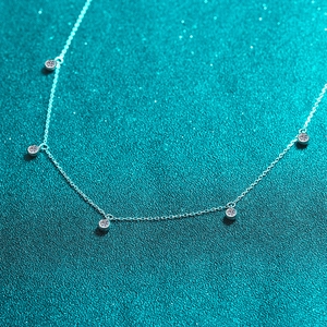 Elegant S925 sterling silver bubble necklace featuring five round moissanite stones