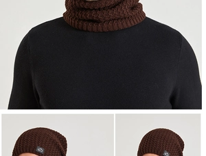 Detail of dark brown knitted beanie and neck gaiter set with mountain logo patch