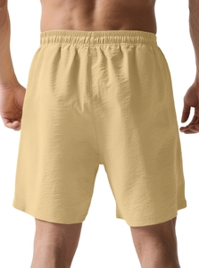 Rear view of khaki quick-dry shorts featuring an elastic drawstring waist and textured fabric