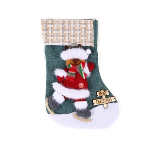 Large green knit Christmas stocking with 3D skating reindeer and Merry Christmas sign