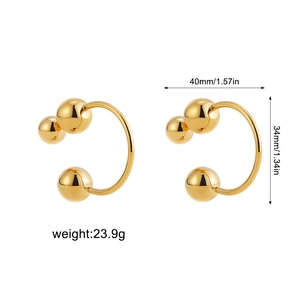 Polished gold metal ball hoop earrings with 40mm width and 34mm height dimensions
