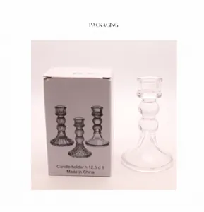 Close-up of 12.5cm clear crystal glass candle holder with elegant spherical tiered design