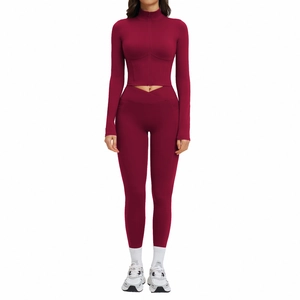 Women's burgundy yoga set with zip crop top and high waist crossover leggings
