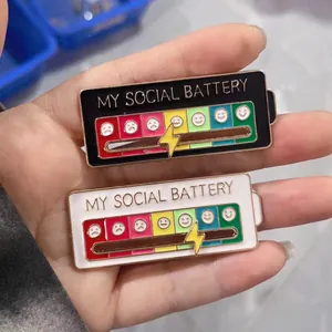 Interactive social battery enamel pin with sliding lightning bolt indicator for mood tracking