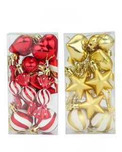 Detailed set of red and gold Christmas ornaments in heart, star, and candy shapes
