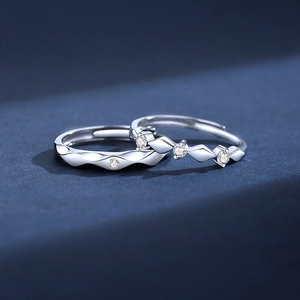 S925 sterling silver couple rings with wavy texture and centered round-cut zirconia stones