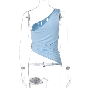 Detail of light blue one-shoulder top showing side rushing and asymmetrical hemline