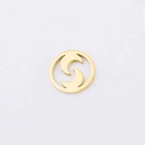 Detail of golden hollow crescent moon jewelry pendant accessory for DIY crafts