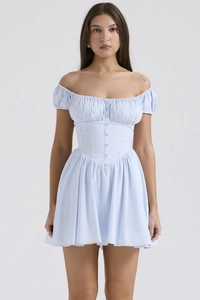 Detail of light blue off-shoulder mini dress with corset waist and decorative buttons