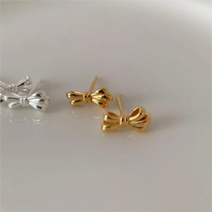 Minimalist 925 sterling silver bow knot stud earrings in gold and silver finishes