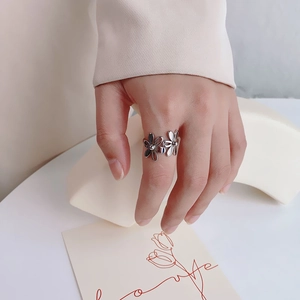 Minimalist silver flower open ring for women with adjustable floral petal design