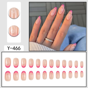 Pink gradient French press-on nails with white flower patterns and 24-piece full set