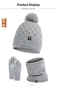 Winter set with grey knitted hat, scarf, and gloves featuring thick pompom and diamond texture