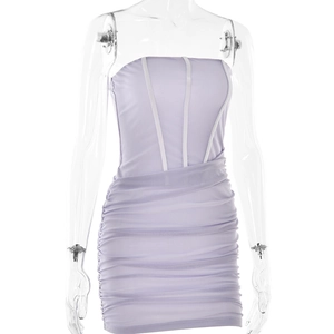 Close-up of lavender bodycon dress featuring a white-lined corset top and ruched skirt