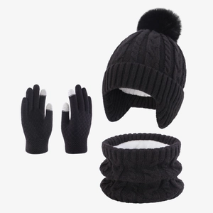 Close-up of cable knit beanie, scarf and gloves set with thick white fleece lining