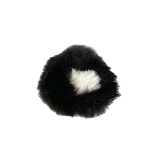 Plush faux fur scrunchie in black and white two-tone design for girls hair accessories