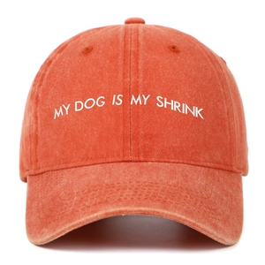 Detailed embroidery of My Dog Is My Shrink text on washed cotton baseball cap