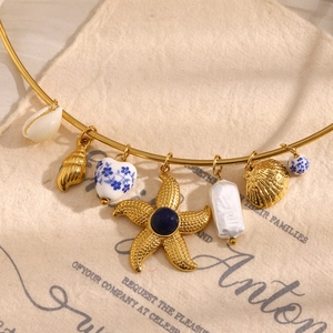 18K gold plated stainless steel ocean theme necklace with starfish shell and heart pendants