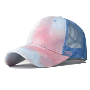 Detail of pink and blue tie-dye ponytail baseball cap with breathable blue mesh back
