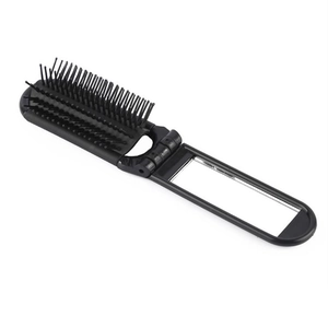 Portable folding hairbrush with integrated vanity mirror in black compact plastic design