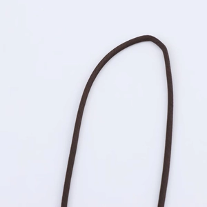 Detail shot of the deep brown satin textured ribbon and woven fabric strap for women