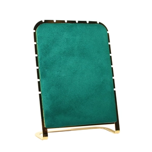 Luxury dark green velvet jewelry display stand for necklaces with elegant gold metal frame
