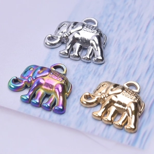 Detail view of elephant pendants in silver, gold, and rainbow stainless steel plating