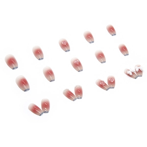 Pink gradient press-on nails with 3D bows, hearts and pearls in ballet style shape