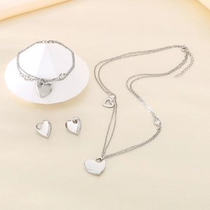 Three-piece silver stainless steel jewelry set featuring heart pendants and elegant style