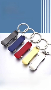 Zinc alloy mini skateboard keychains in five colors showing detailed realistic design