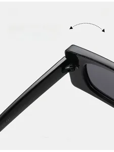 Close-up of durable metal hinge on black retro square sunglasses with parameters