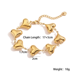 Macro view of 18K gold plated heart bracelet showing size dimensions and S. Steel material