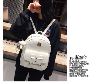 White PU leather backpack with a bow decoration and a cute bear pendant on the side