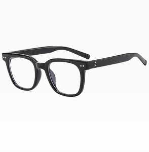 Detail view of black square frame glasses with silver rivets and polished finish