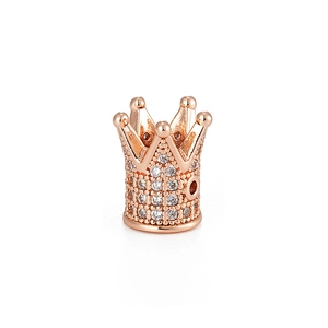 Macro detail of rose gold micro-pave crown bead with clear cubic zirconia stones