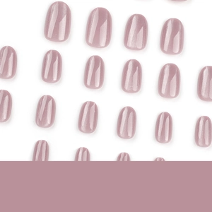 Short round cat-eye press-on nails in dusty rose with shimmering magnetic light effect