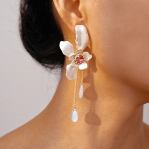 Sparkling crystal flower earrings with pink gemstone and blue water drop tassels