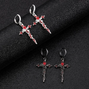 Detailed thorns and rose relief on cross earrings with red heart gemstone
