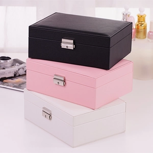 Double-layer jewelry storage box in pink, black and white leather with metal lock