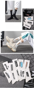 Detail of crew sports socks with graphic prints like thinking and battery status bars