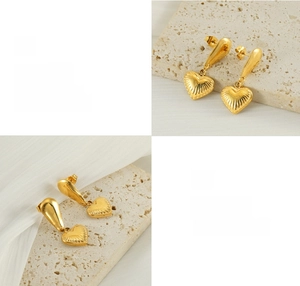 Detail of 18K gold-plated heart earrings featuring radial texture and polished finish